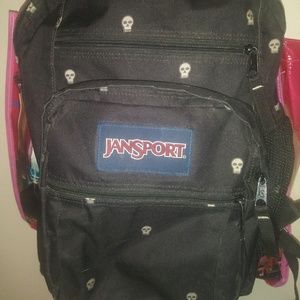 USED BLACK JANSPORT SKULL BACKPACK